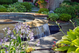 Glenview landscaping project featuring Lannon stone and bluestone spa.