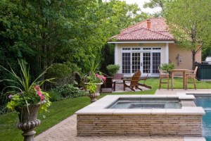 Kenilworth landscaping project by Van Zelst featuring pool and fire pit.