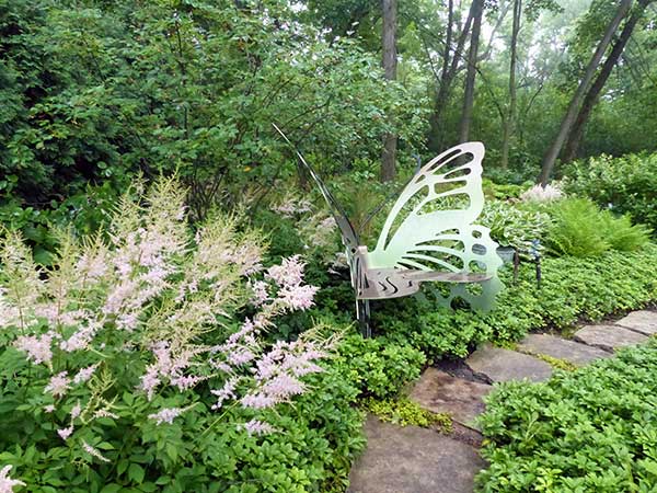 large garden butterfly sculpture butterfly garden sculpture with pink astilbe