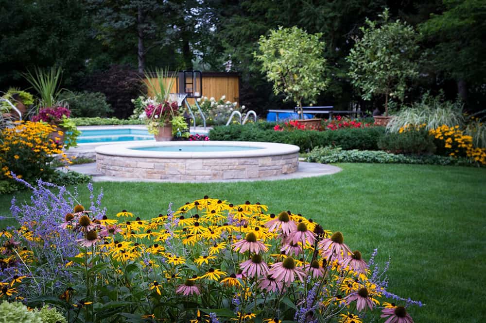 glenview-lawn-after The space has been transformed into a favorite retreat for family and friends who take advantage of the stone-and-concrete spa, as well as an inviting pool, whenever the weather permits.