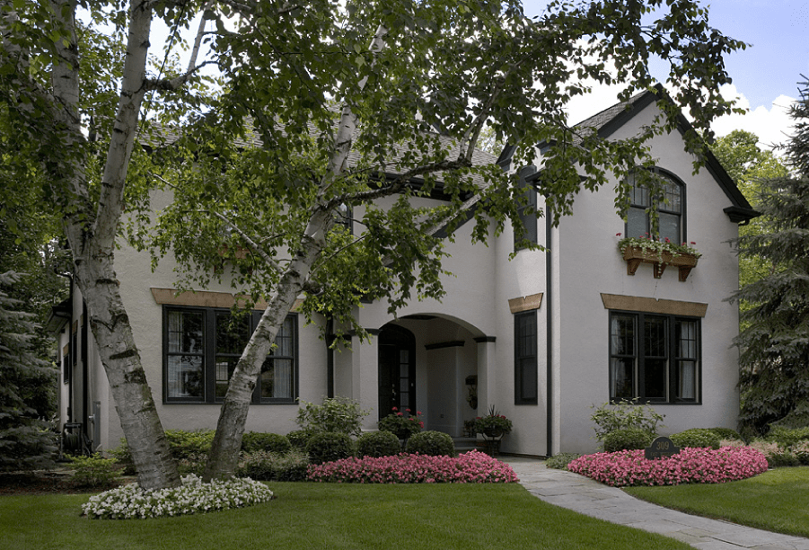 lake-bluff-front-yard-after Adding judicious touches of color and a few taller elements, and filling window boxes, makes a significant difference in how the home appears from the street.