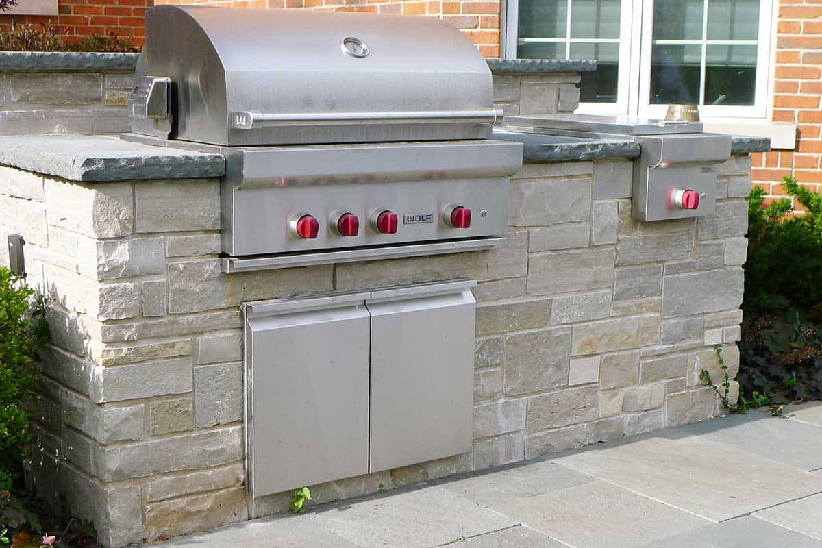 Outdoor Kitchen Island and Grill with Bluestone Countertop - Van Zelst